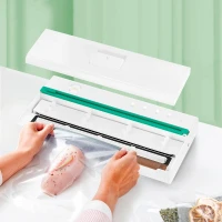 Вакуумный упаковщик Kitfort КТ-1540 120Вт 0.45Бар шир.пак.:28см белый/зеленый