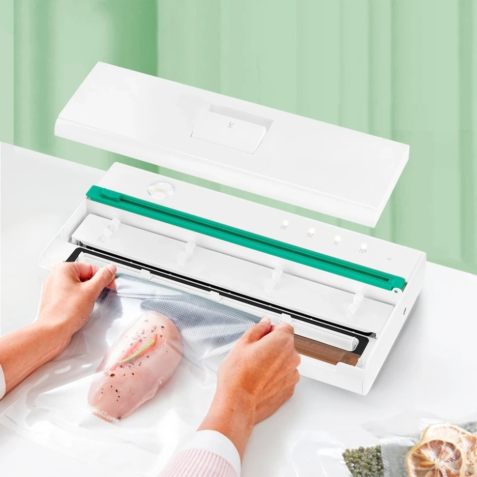 Вакуумный упаковщик Kitfort КТ-1540 120Вт 0.45Бар шир.пак.:28см белый/зеленый