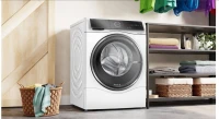 Стиральная машина Bosch Serie 8 WNC254A0SN пан.швед. загр.фронтальная макс.:10.5кг (с сушкой) белый