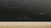 Индукционная варочная поверхность Bosch PUJ611BB5E черный