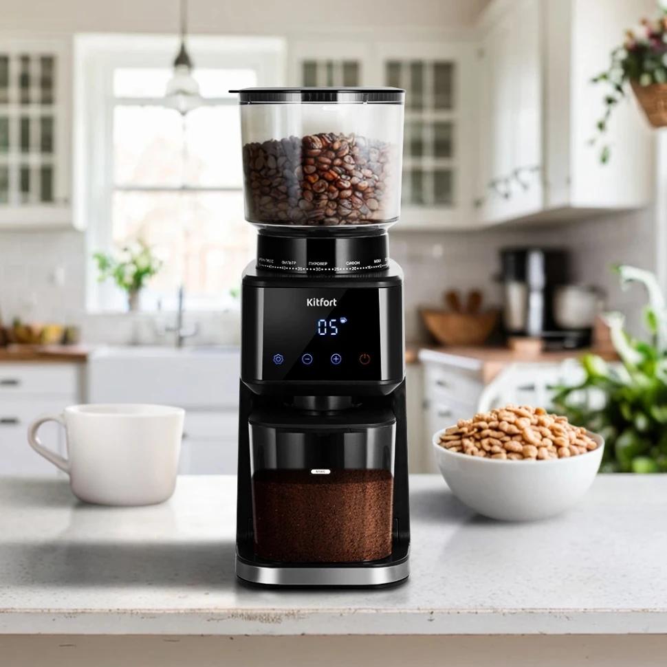 Кофемолка Kitfort КТ-7517 165Вт сист.помол.:жернова вместим.:275гр черный/серебристый  