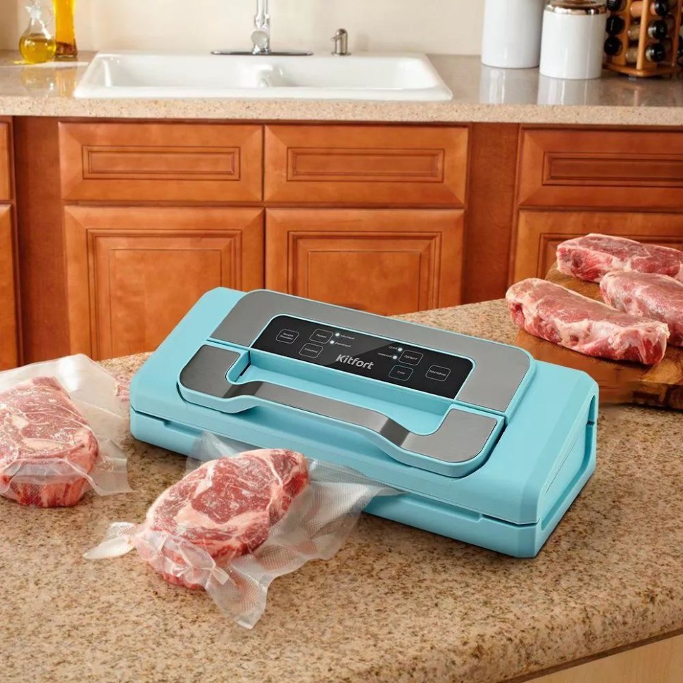 Вакуумный упаковщик Kitfort КТ-1535 110Вт 0.8Бар шир.пак.:30см голубой/серебристый