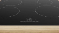 Индукционная варочная поверхность Bosch PUE61RBB6E черный